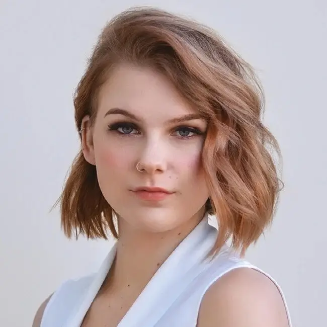 Strawberry blonde hair colour with warm natural tones at Slinky Hairdressing